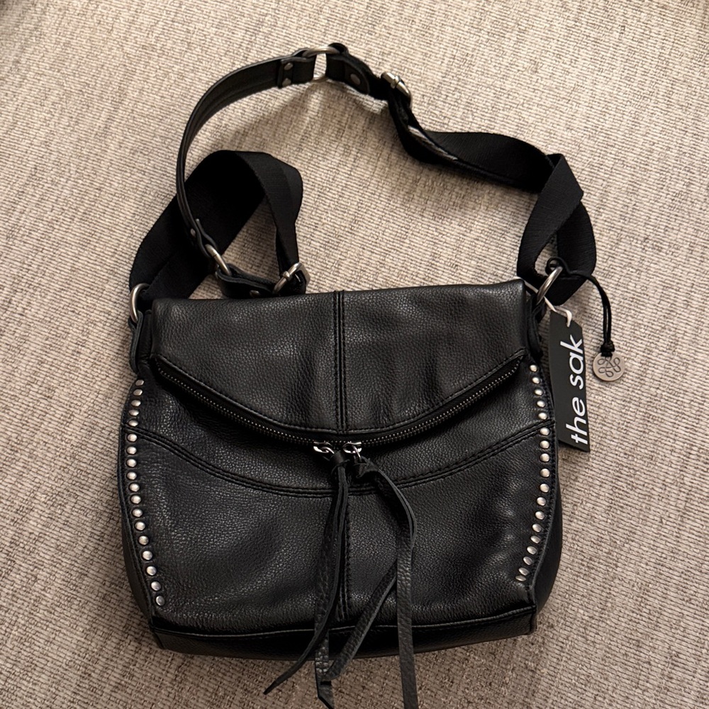 The Sak Black Leather Crossbody Bag with Silver Accents